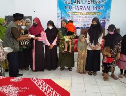 Bulan Bakti Muharam TP PKK Desa Jatimulyo Berikan Santunan Anak Yatim